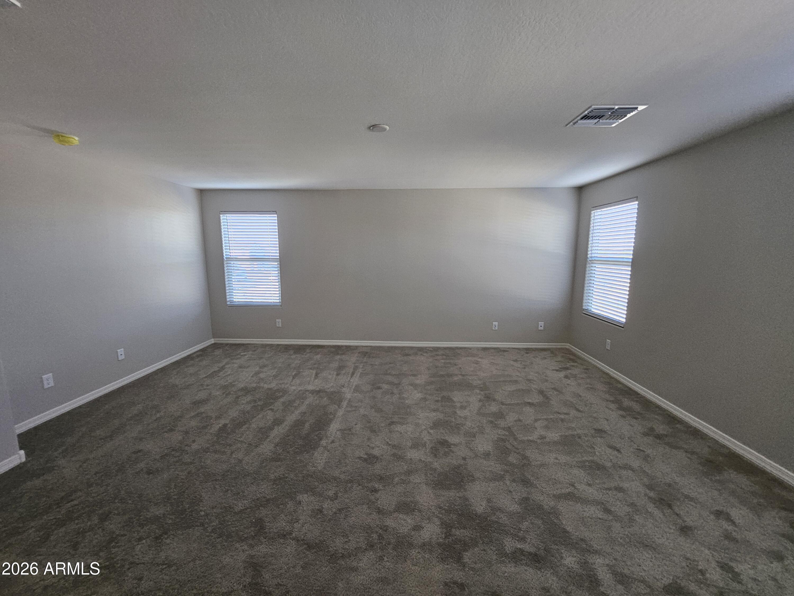 3010 East Augusta Avenue Gilbert, AZ 85298 - Photo 18 of 33 an empty room with a empty space and windows