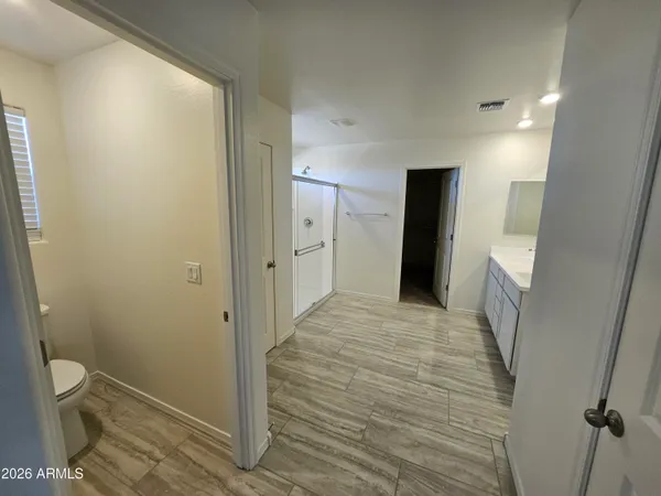 a bathroom with a sink and toilet