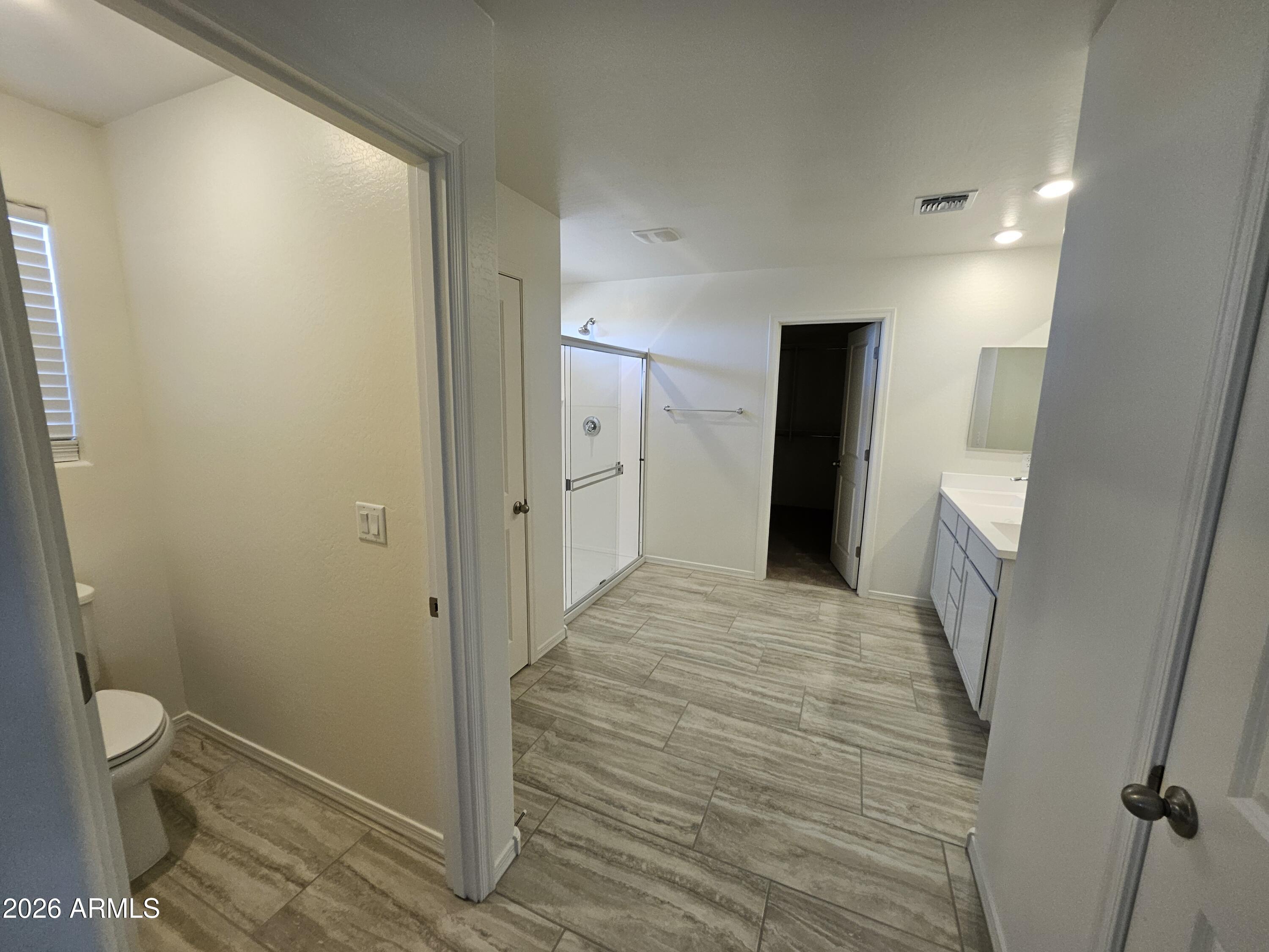 3010 East Augusta Avenue Gilbert, AZ 85298 - Photo 19 of 33 a bathroom with a sink and toilet