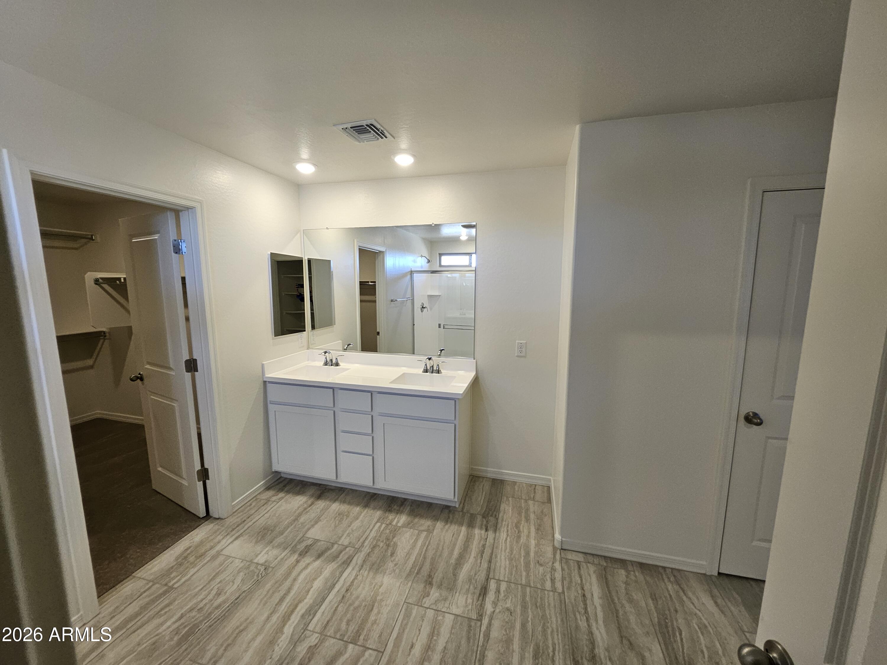 3010 East Augusta Avenue Gilbert, AZ 85298 - Photo 23 of 33 a bathroom with a sink vanity granite tub and shower