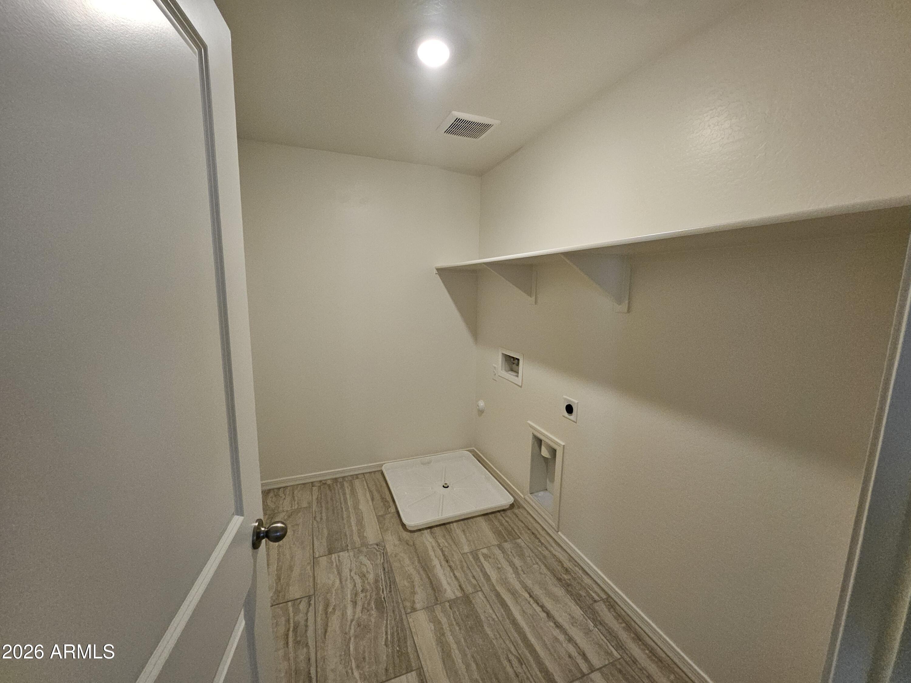 3010 East Augusta Avenue Gilbert, AZ 85298 - Photo 25 of 33 an empty room with wooden floor