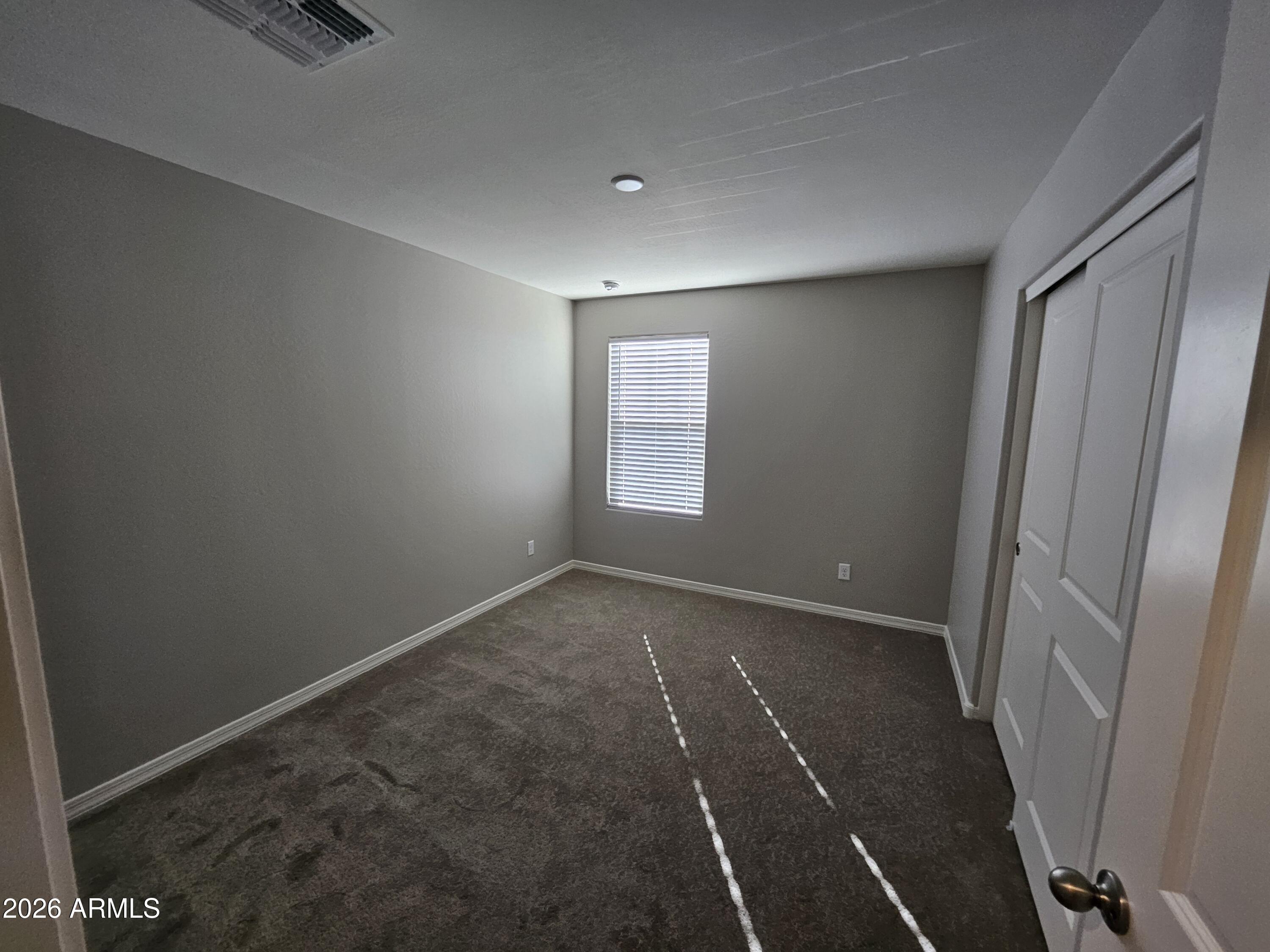 3010 East Augusta Avenue Gilbert, AZ 85298 - Photo 26 of 33 an empty room with windows