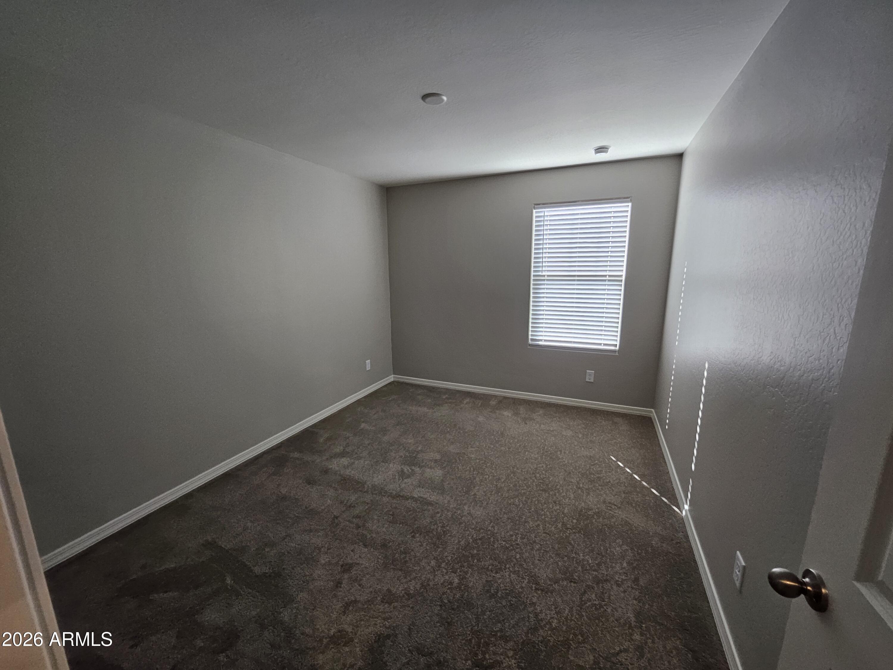 3010 East Augusta Avenue Gilbert, AZ 85298 - Photo 28 of 33 an empty room with a window