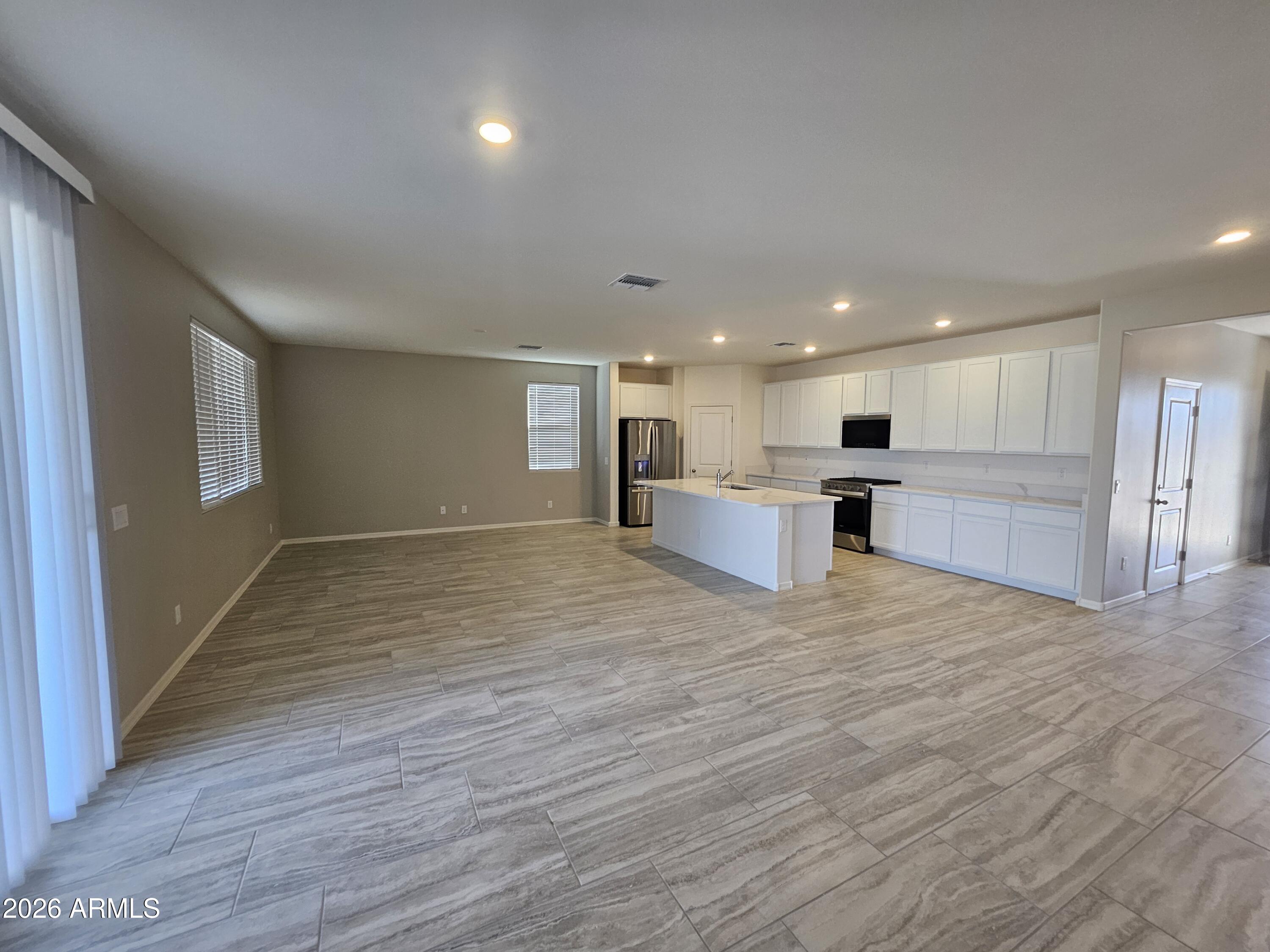 3010 East Augusta Avenue Gilbert, AZ 85298 - Photo 6 of 33 a view of kitchen with wooden floor