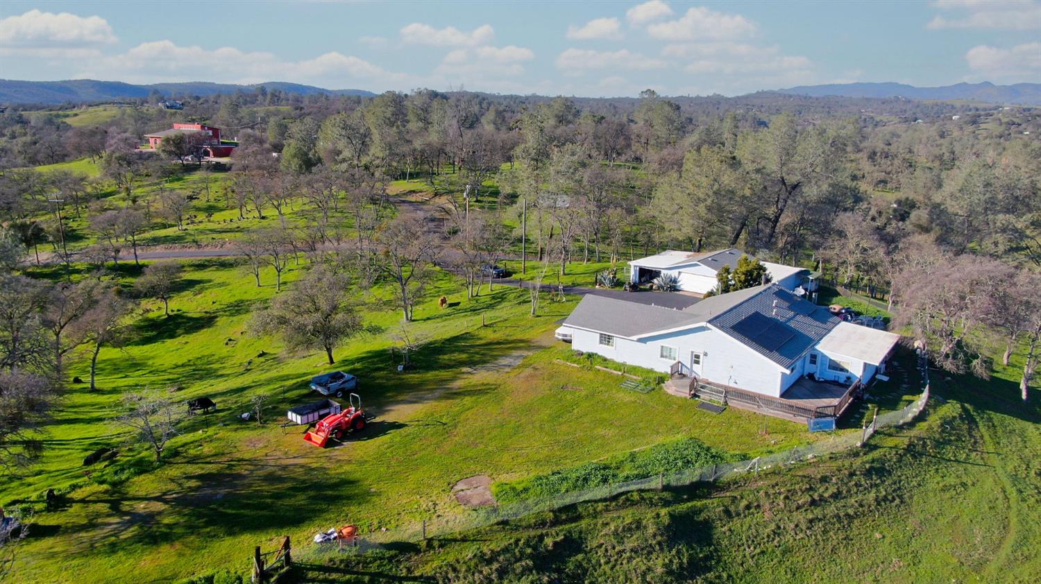 3653 Chuckwagon Drive Copperopolis, CA 95228 - Photo 2 of 73 an aerial view of a house with a garden