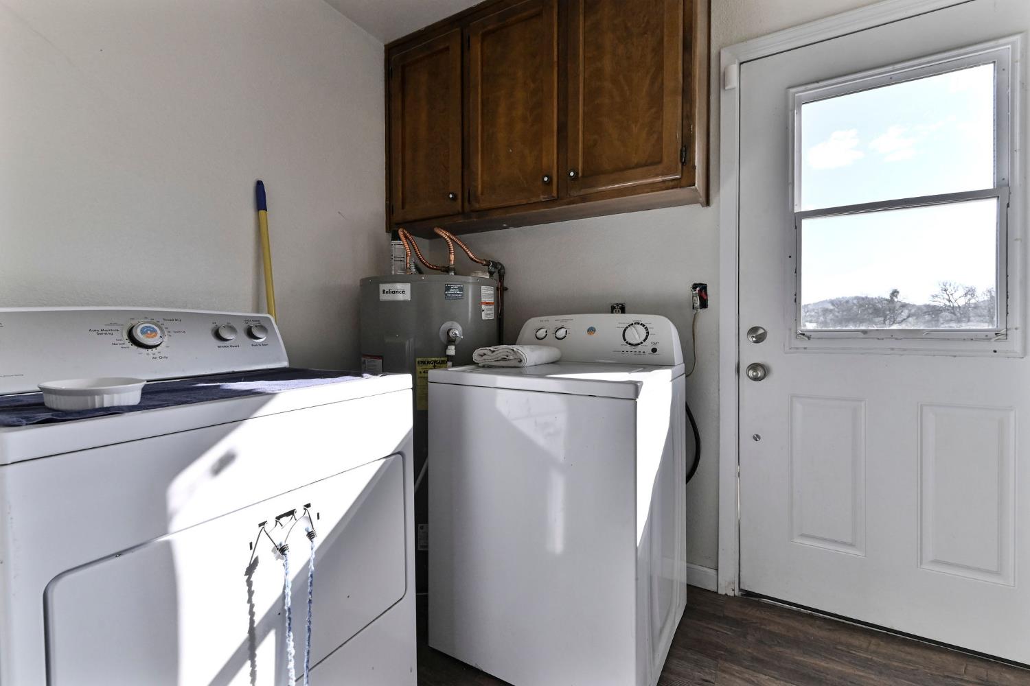 3653 Chuckwagon Drive Copperopolis, CA 95228 - Photo 29 of 73 a utility room with dryer and washer