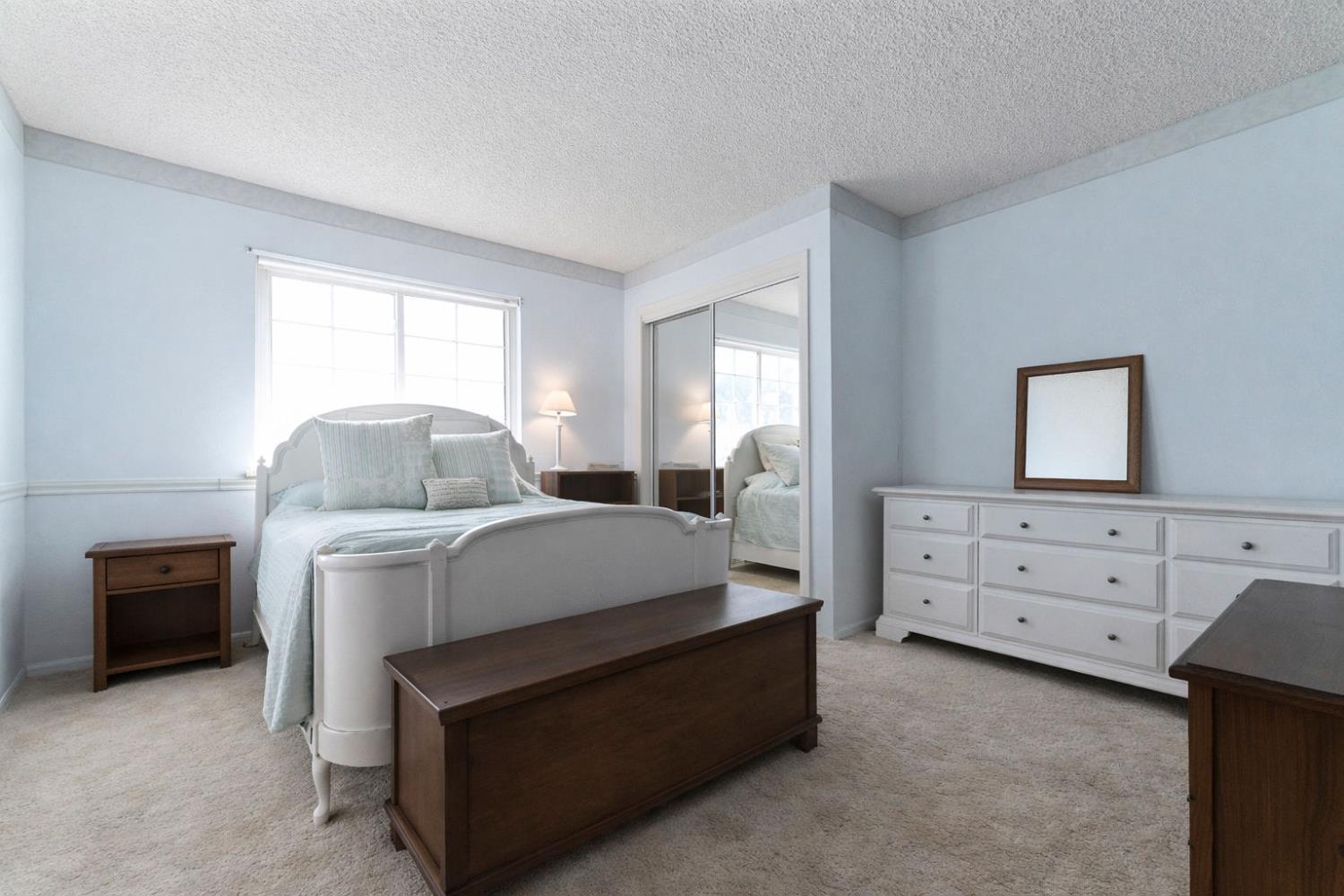 3653 Chuckwagon Drive Copperopolis, CA 95228 - Photo 31 of 73 a bedroom with a bed and a dresser