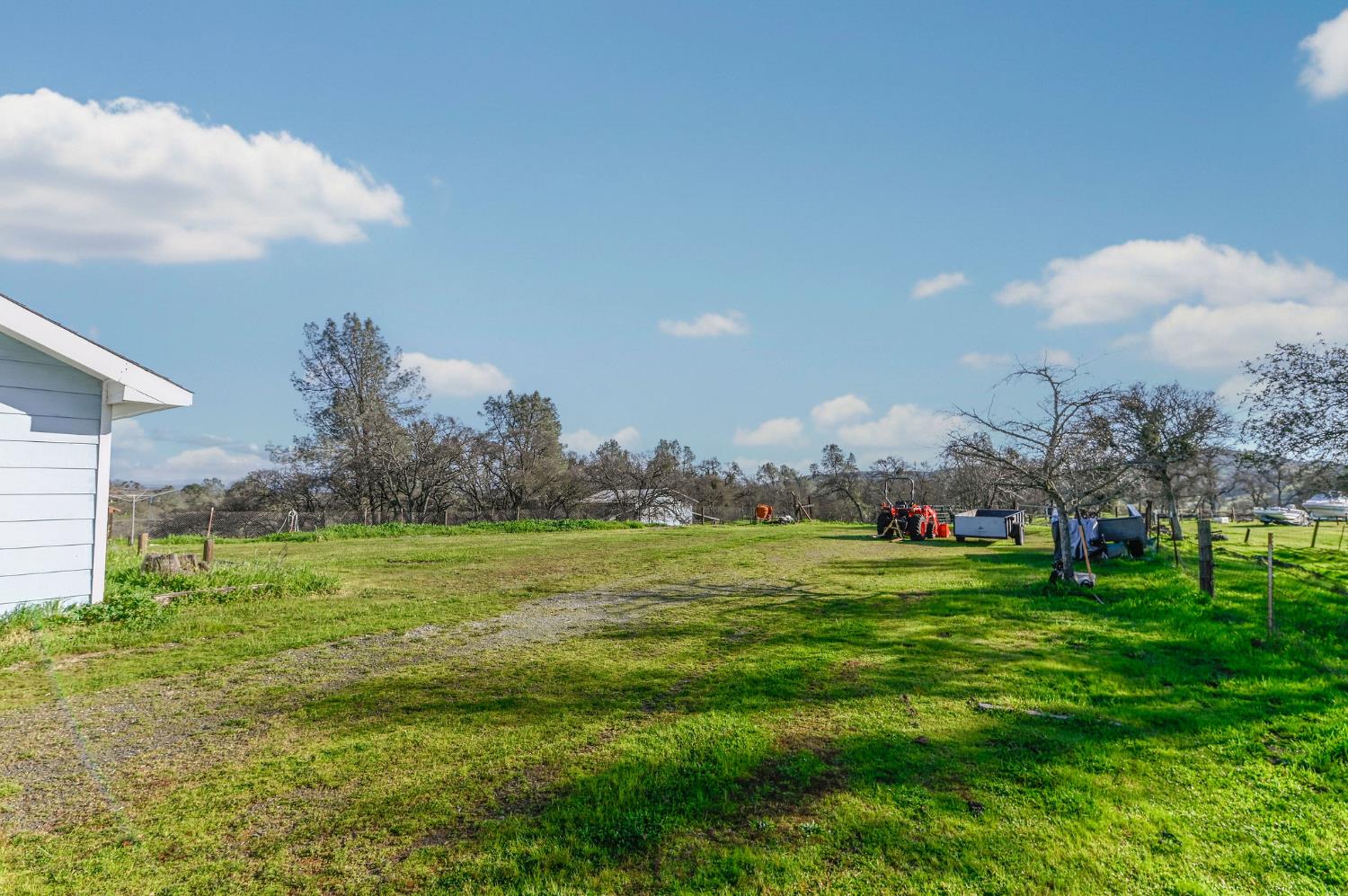 3653 Chuckwagon Drive Copperopolis, CA 95228 - Photo 36 of 73 a grassy field with trees in the background