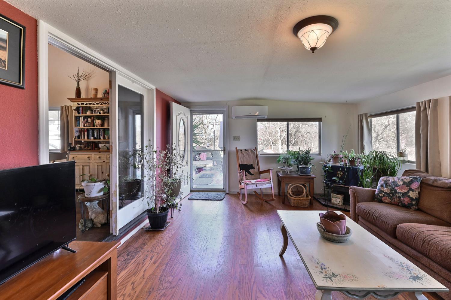 3653 Chuckwagon Drive Copperopolis, CA 95228 - Photo 4 of 73 a living room with furniture and a flat screen tv