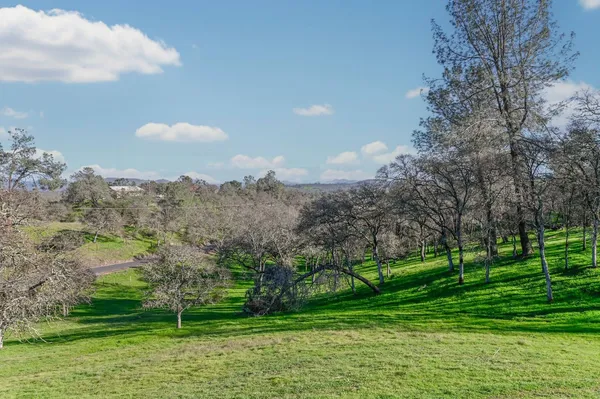 a view of mountains and valleys
