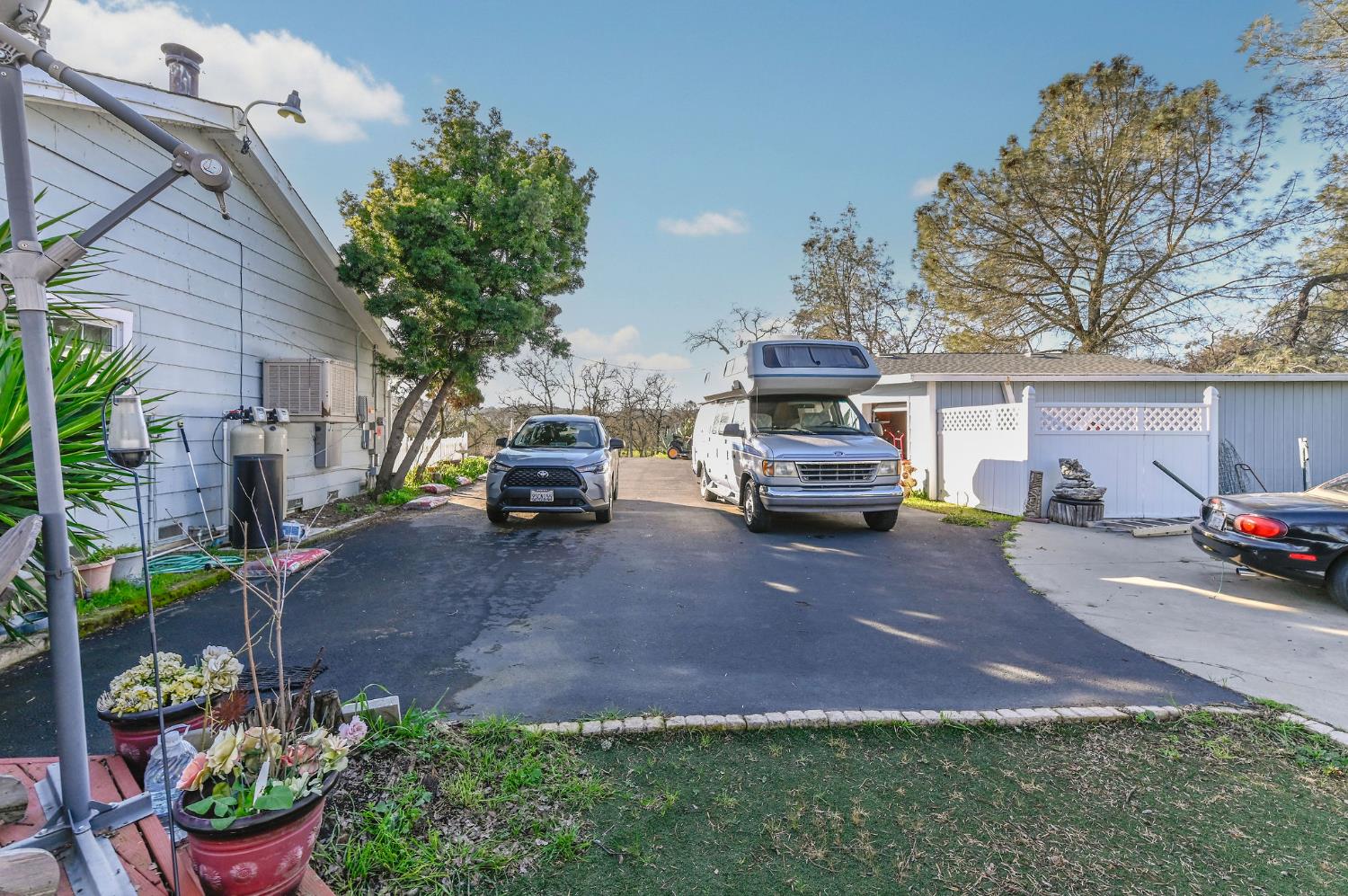 3653 Chuckwagon Drive Copperopolis, CA 95228 - Photo 46 of 73 a car parked in front of a house