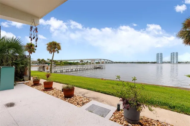 a view of swimming pool with furniture