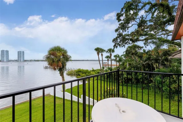 a view of multiple houses with outdoor space
