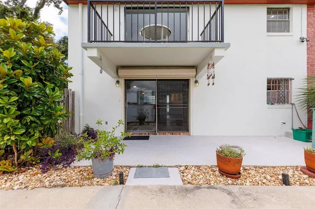 a view of a swimming pool with a terrace