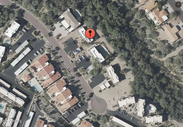 an aerial view of residential house with parking space