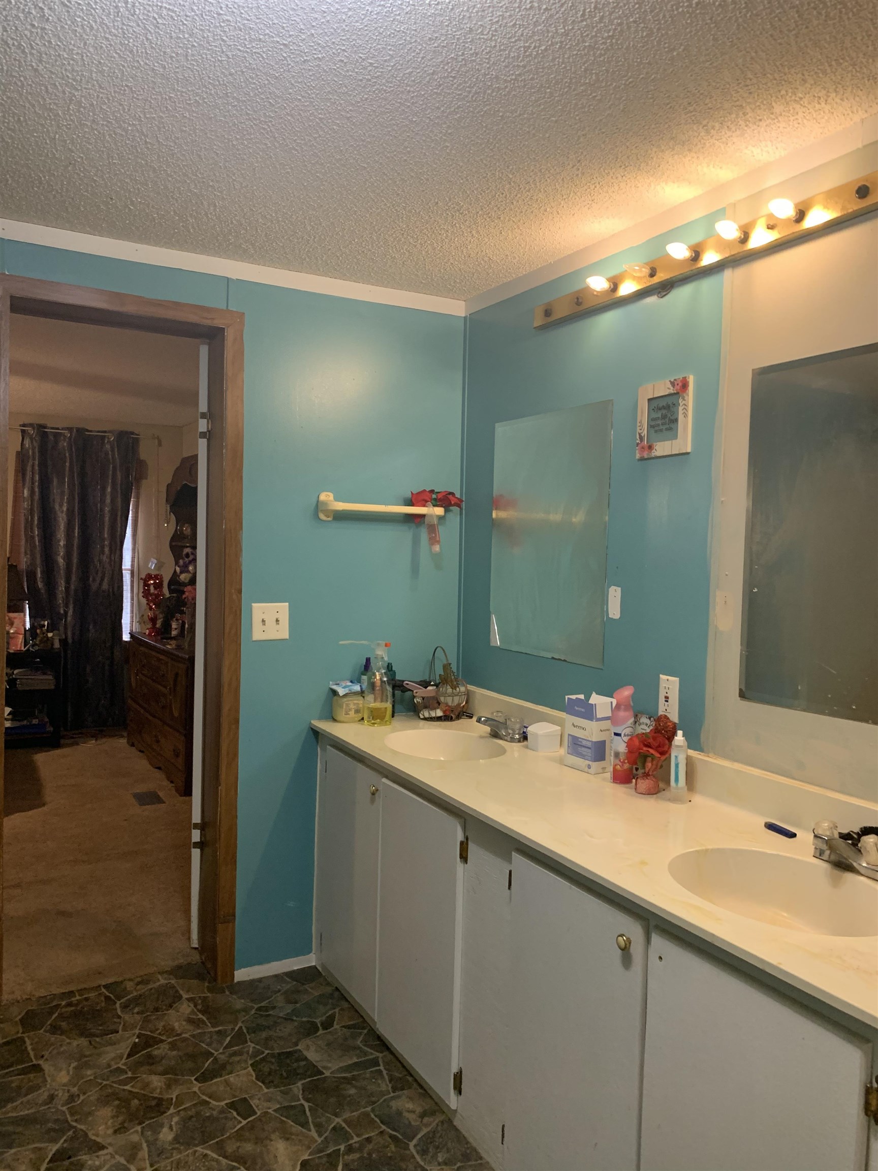 6681 Lightfoot Luckett Road Ripley, TN 38063 - Photo 17 of 17 a bathroom with a sink and mirror