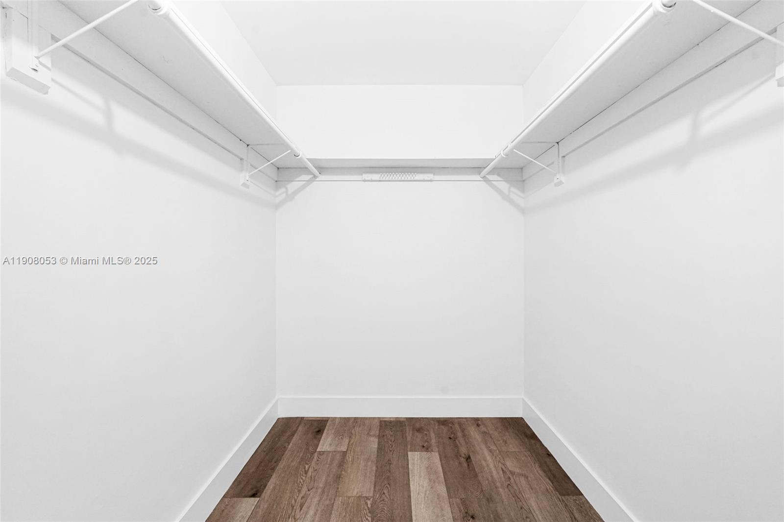 136 Northwest 53rd Street Miami, FL 33127 - Photo 18 of 28 a view of a room with wooden floor