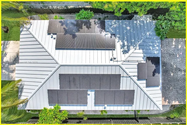 a view of a small white roof deck