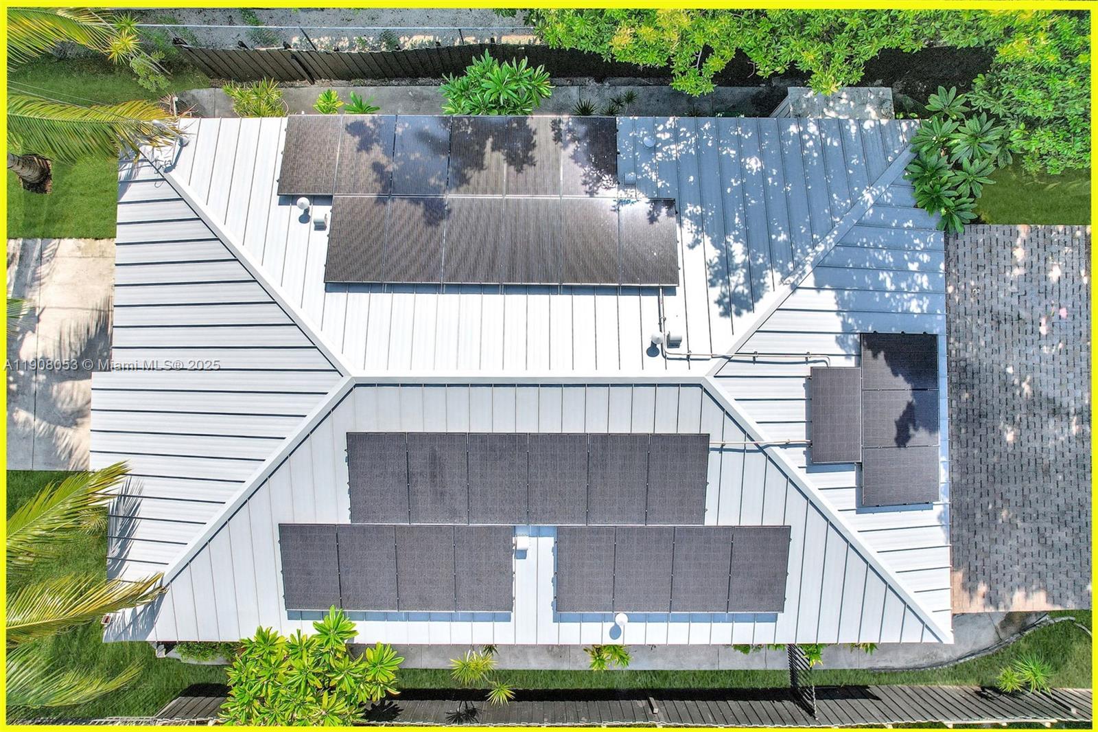 136 Northwest 53rd Street Miami, FL 33127 - Photo 4 of 28 a view of a small white roof deck