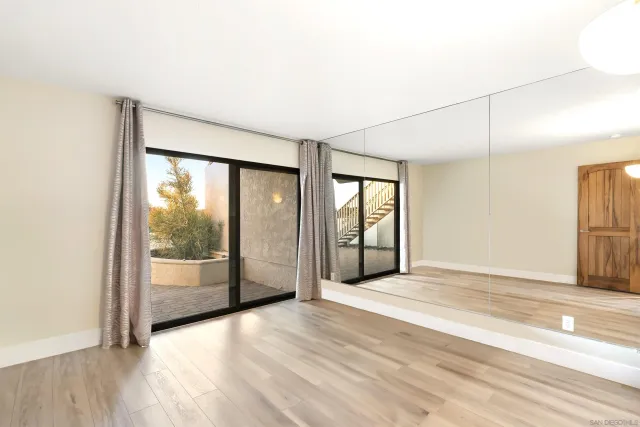 an empty room with windows