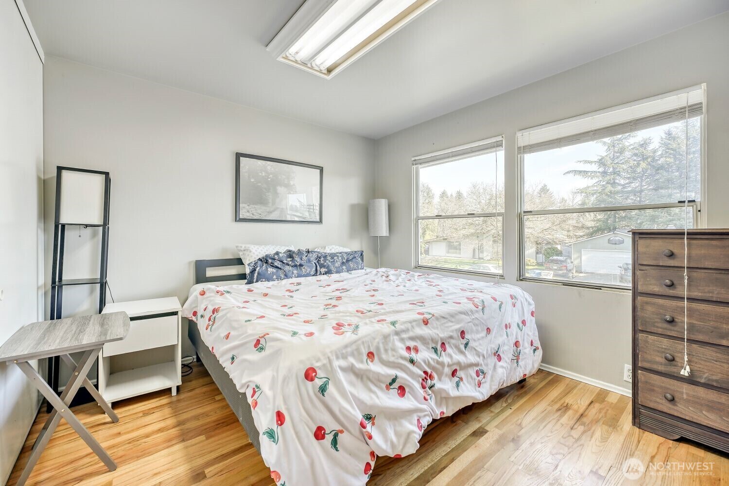 1401 Lake Youngs Way Southeast Renton, WA 98058 - Photo 13 of 27 a bedroom with a bed and a window