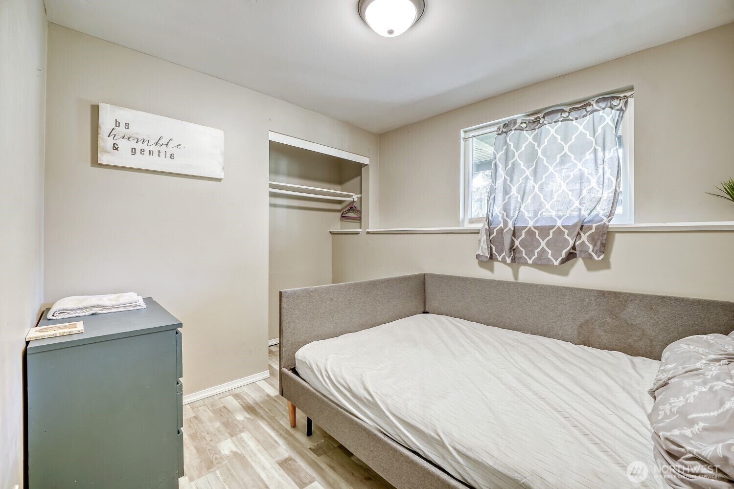 1401 Lake Youngs Way Southeast Renton, WA 98058 - Photo 18 of 27 a bedroom with a bed and a window