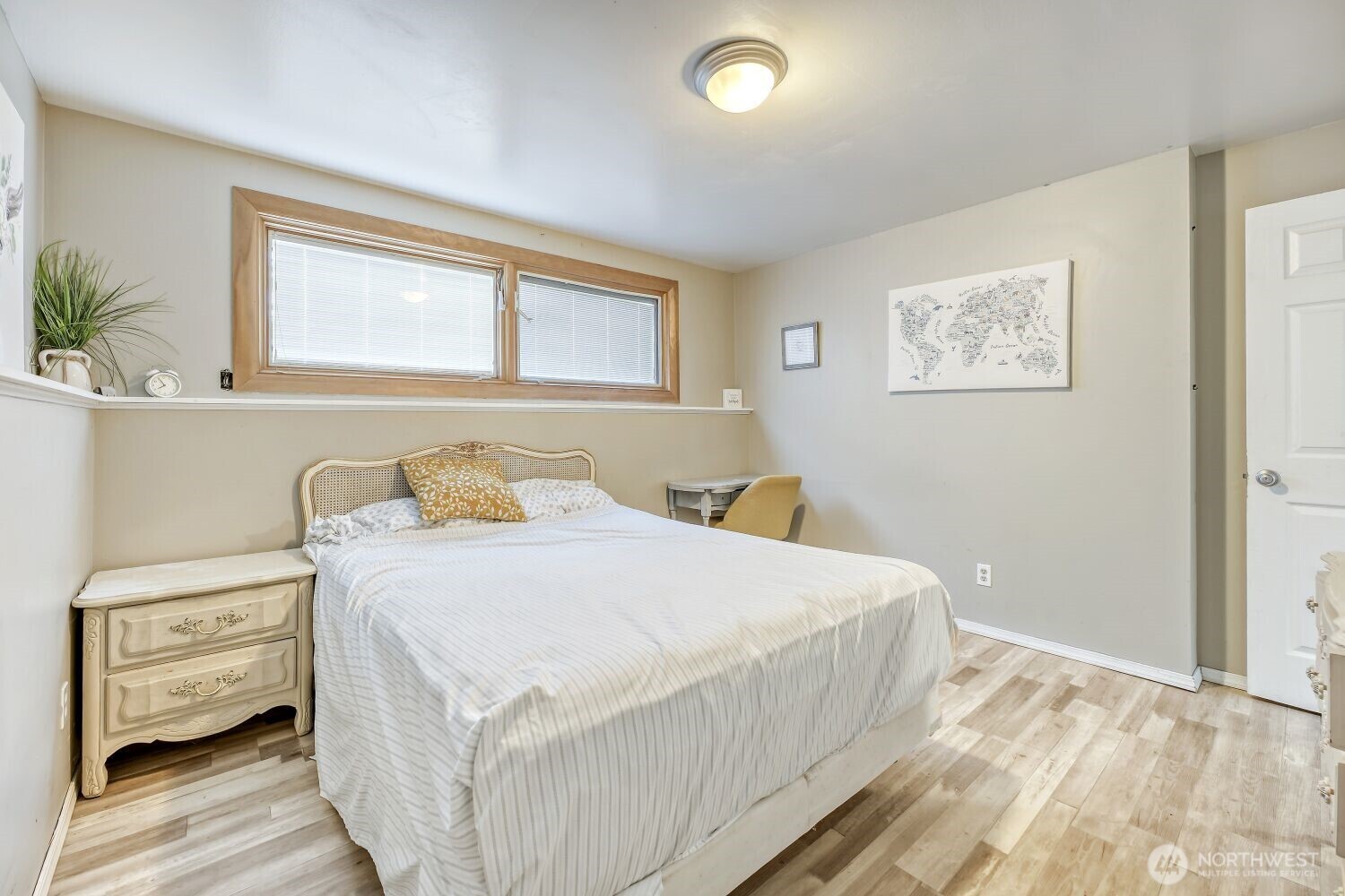 1401 Lake Youngs Way Southeast Renton, WA 98058 - Photo 21 of 27 a bedroom with a bed and a window
