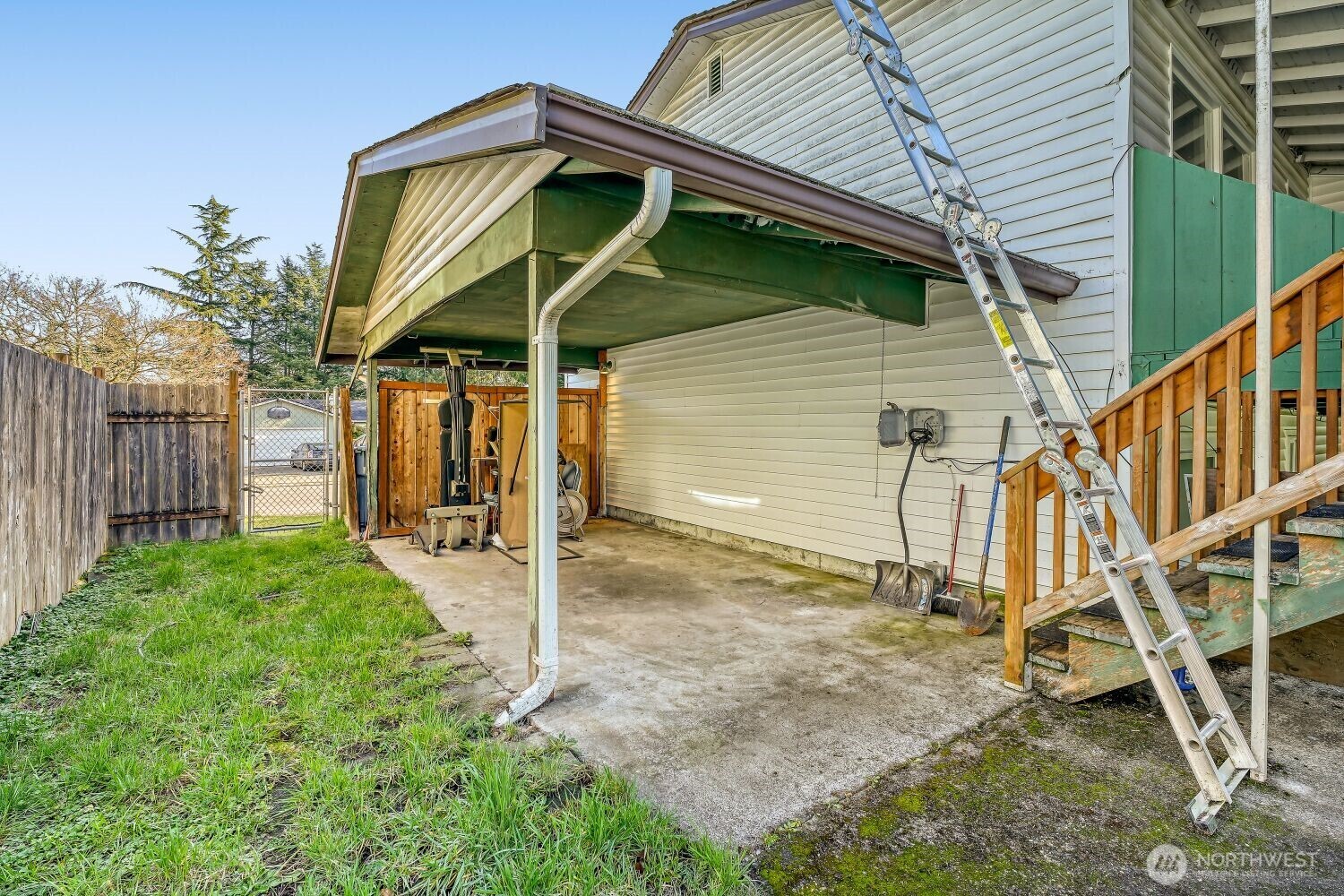 1401 Lake Youngs Way Southeast Renton, WA 98058 - Photo 24 of 27 a view of a house with backyard and wooden fence