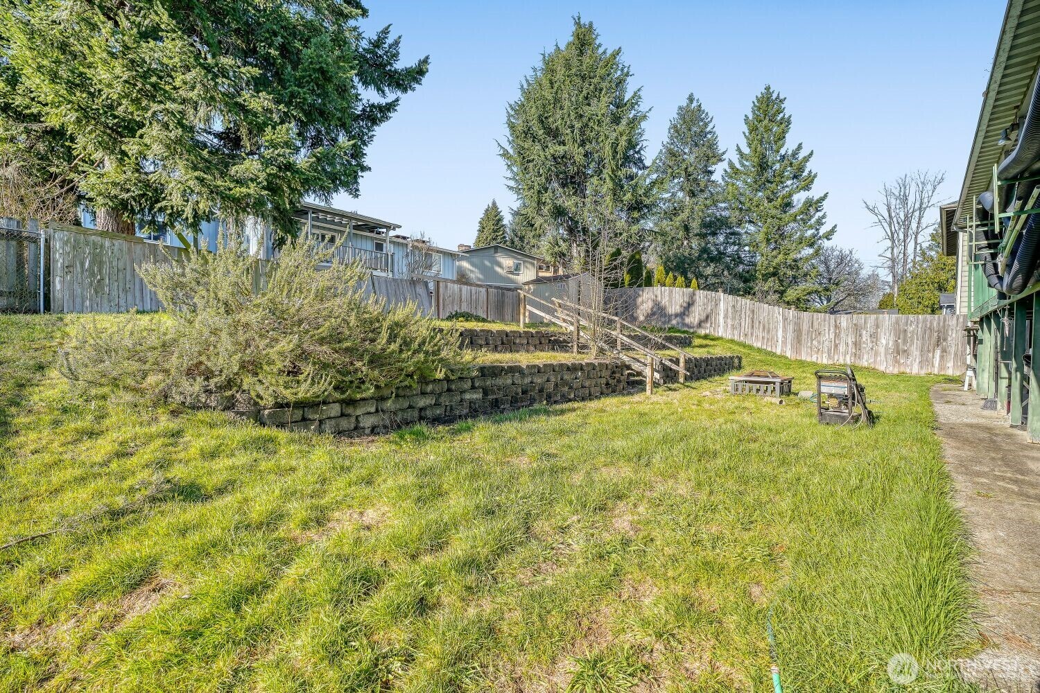 1401 Lake Youngs Way Southeast Renton, WA 98058 - Photo 25 of 27 a view of a yard with swimming pool