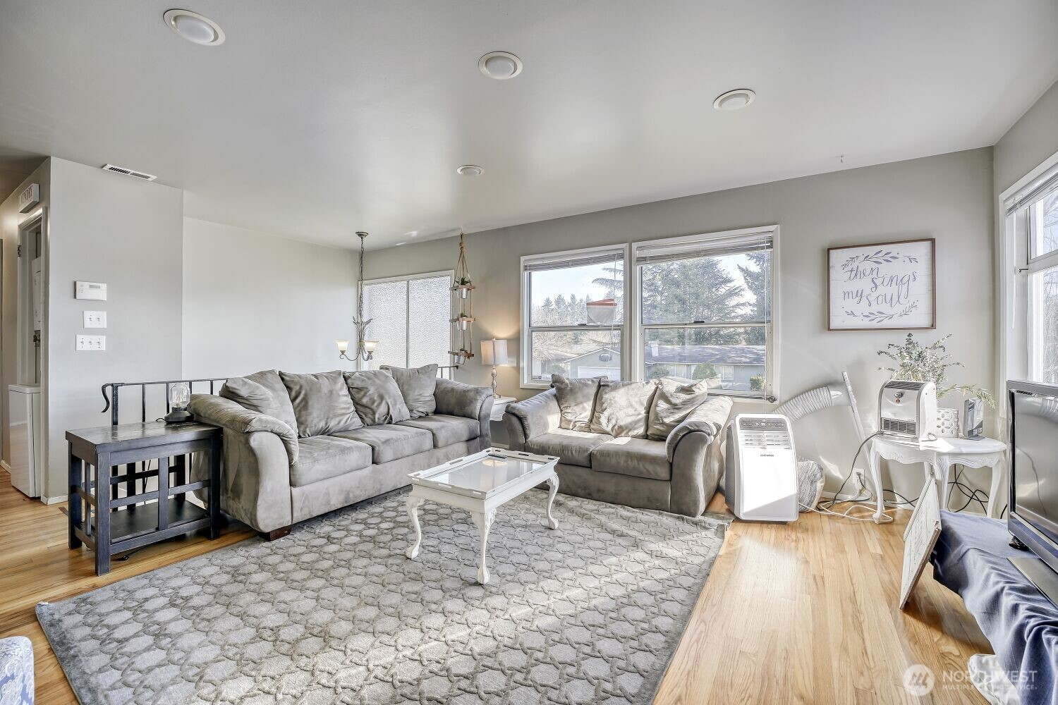 1401 Lake Youngs Way Southeast Renton, WA 98058 - Photo 5 of 27 a living room with furniture large window and a table