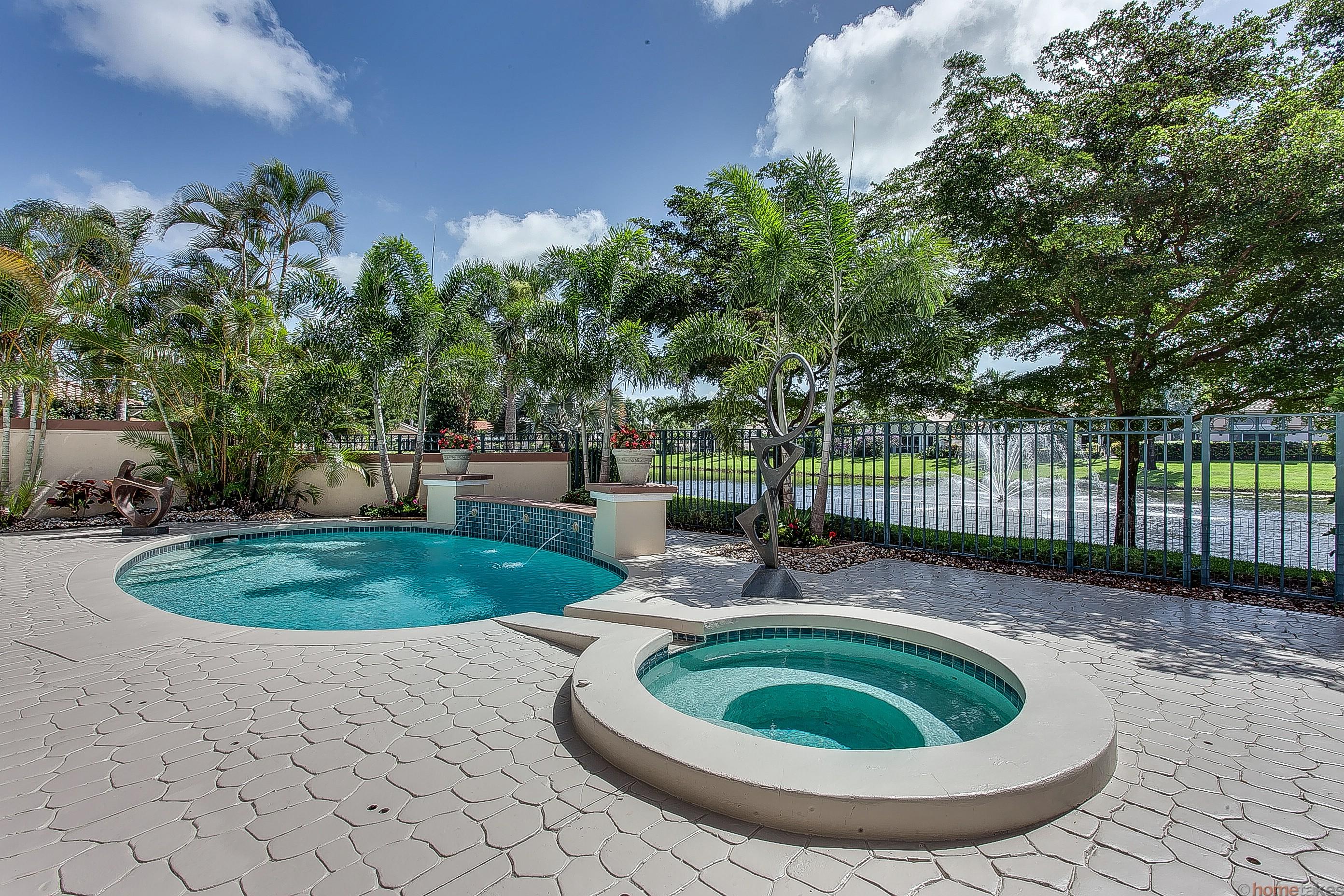 Pool and Spa with Lake and Fountain View