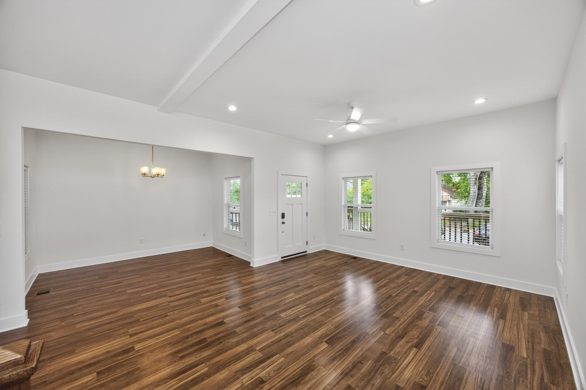 7 Decatur Street Nashville, TN 37210 - Photo 9 of 43 a view of an empty room with wooden floor and a window