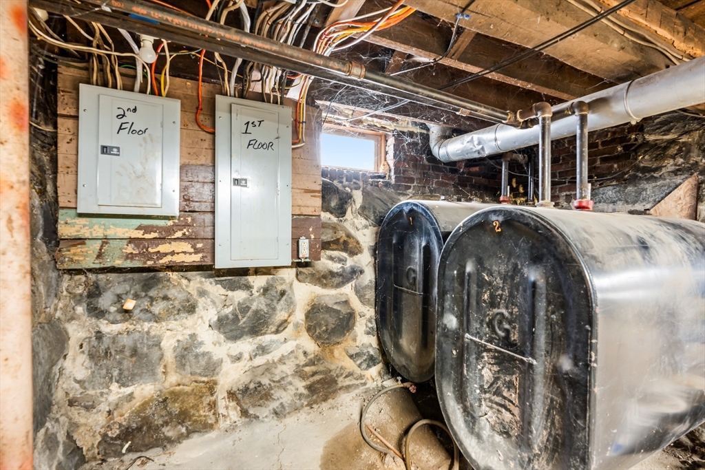 77 Wheeler Street Athol, MA 01331 - Photo 23 of 39 a view of walk in closet with clothes and shoes