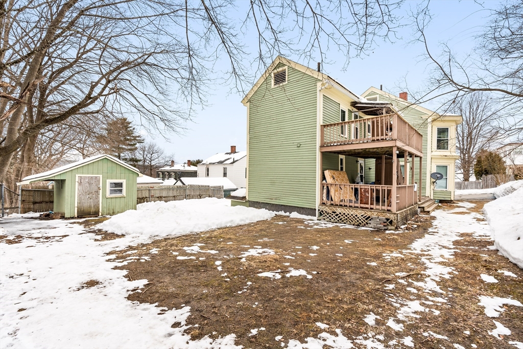 77 Wheeler Street Athol, MA 01331 - Photo 30 of 39 a view of a white house with a yard covered in snow