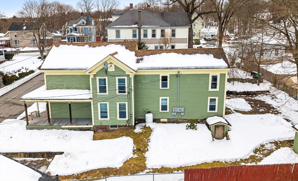77 Wheeler Street Athol, MA 01331 - Photo 35 of 39 a view of a white house with large windows next to a road