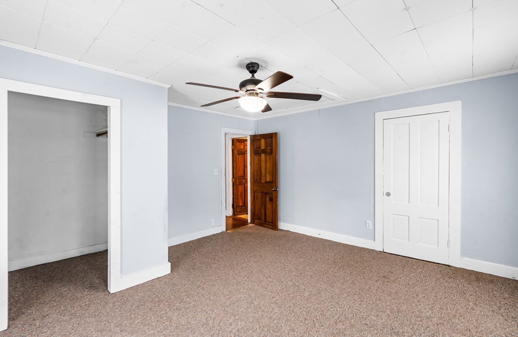 77 Wheeler Street Athol, MA 01331 - Photo 9 of 39 a view of an empty room with a ceiling fan
