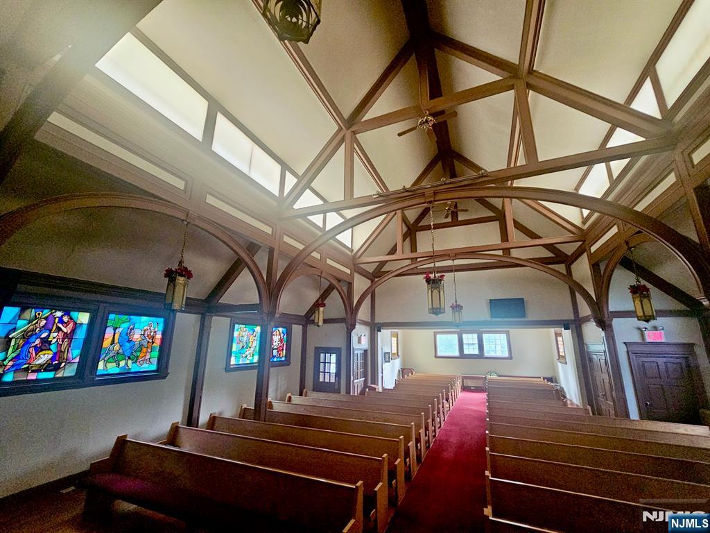 283 Harrington Avenue Closter, NJ 07624 - Photo 12 of 17 a room with lots of furniture and a window