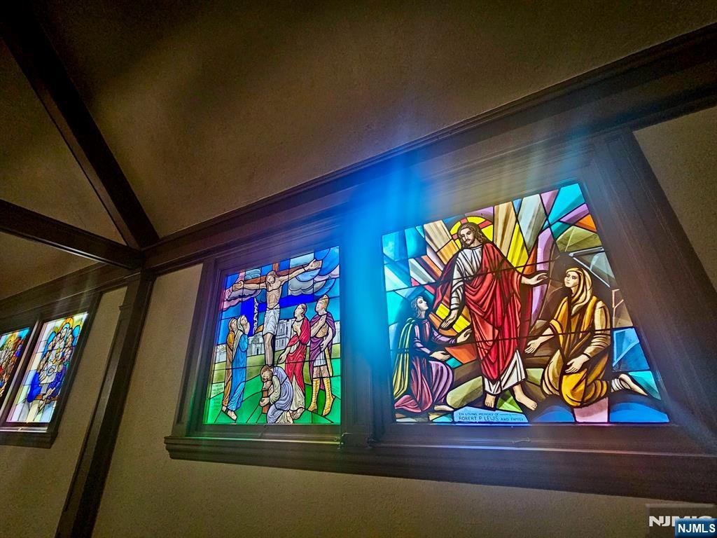 283 Harrington Avenue Closter, NJ 07624 - Photo 14 of 17 a wooden door with glass top table