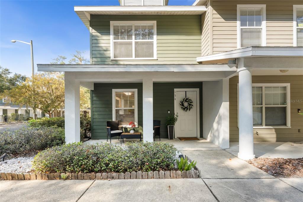 2348 Southwest 42nd Drive, Unit 154 Gainesville, FL 32607 - Photo 1 of 35 a front view of a house with a porch