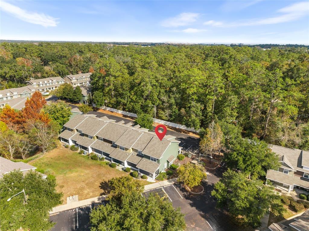 2348 Southwest 42nd Drive, Unit 154 Gainesville, FL 32607 - Photo 28 of 35 an aerial view of residential houses with outdoor space