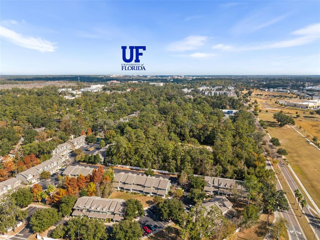 2348 Southwest 42nd Drive, Unit 154 Gainesville, FL 32607 - Photo 33 of 35 an aerial view of residential houses with outdoor space