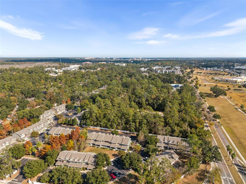 2348 Southwest 42nd Drive, Unit 154 Gainesville, FL 32607 - Photo 35 of 35 an aerial view of residential building with parking space