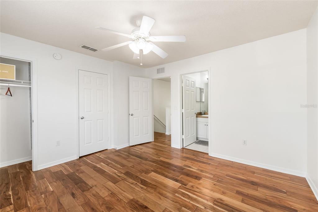 2348 Southwest 42nd Drive, Unit 154 Gainesville, FL 32607 - Photo 7 of 35 a view of a big room with wooden floor and closet in a kitchen