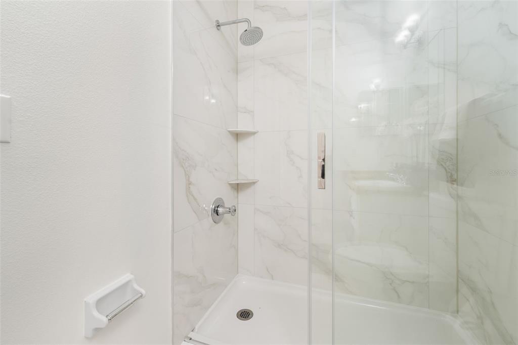 2348 Southwest 42nd Drive, Unit 154 Gainesville, FL 32607 - Photo 9 of 35 a bathroom with a shower