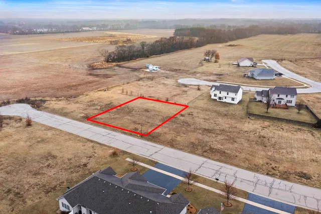 a view of a swimming pool and an outdoor space