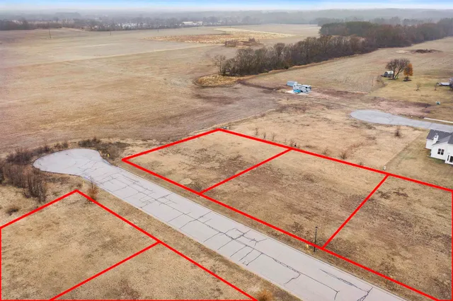 an outdoor space with lounge chair