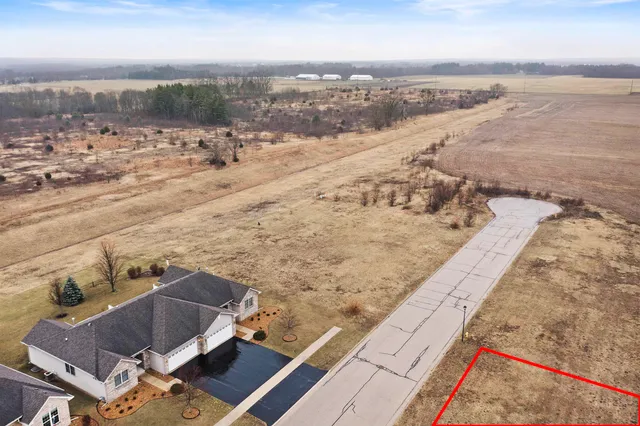 an outdoor space with lounge chair