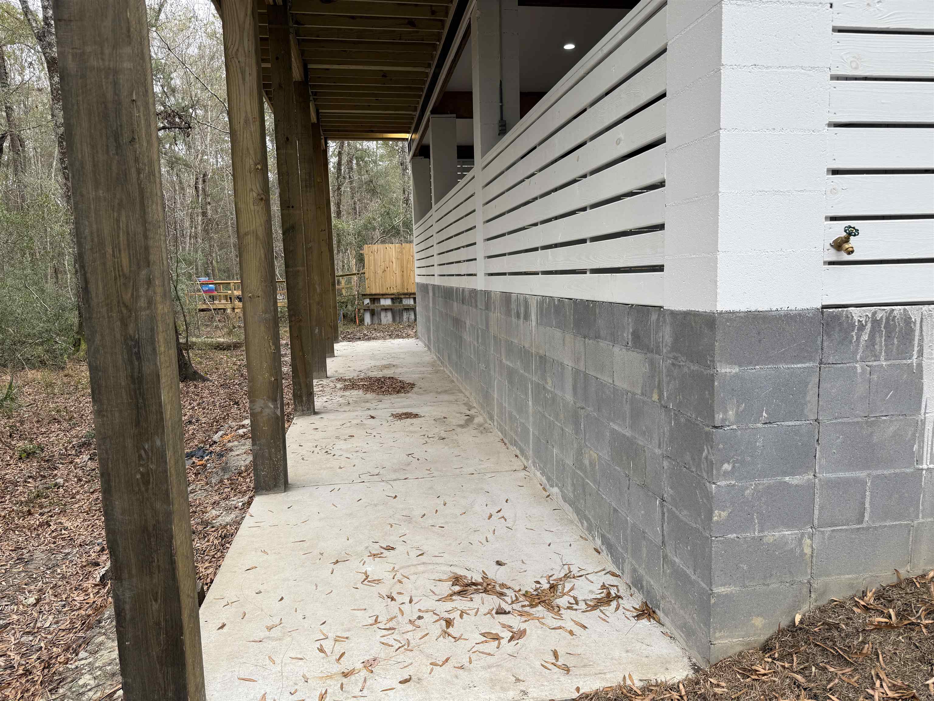 191 Carlisle Way Myrtle Beach, SC 29579 - Photo 47 of 50 Concrete patio just behind the garage.