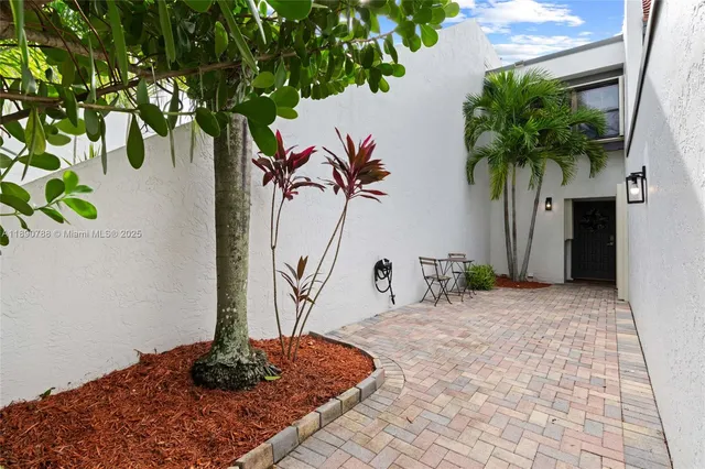 a vase of flowers sitting on a table