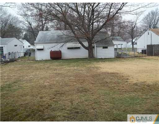 39 Kenmore Road Edison, NJ 08817 - Photo 6 of 6 a view of a house with a yard